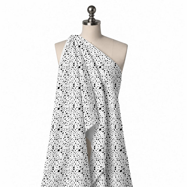 Draped on a mannequin: all-over scatter of flat black oval dots and short elongated dashes, design Design No_4032, Clothwala