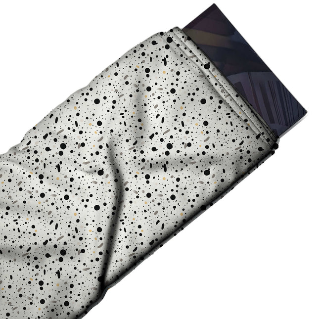 Flat fabric swatch: dense all-over speckle of small black dots in mixed sizes with short, design Design No_4046, Clothwala