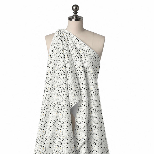 Draped on a mannequin: dense all-over speckle of small black dots in mixed sizes with, design Design No_4046, Clothwala