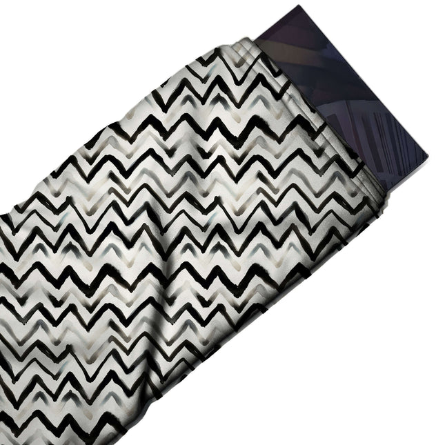 Flat fabric swatch: horizontal rows of black brush-painted zigzag lines of varying weight, design Design No_4022, Clothwala
