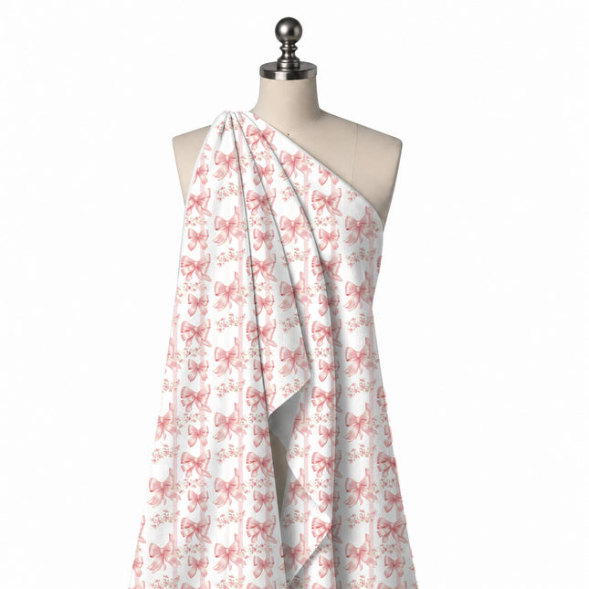 Draped on a mannequin: all-over layout of shaded blush pink satin bows in several shapes, design Design No_4872, Clothwala
