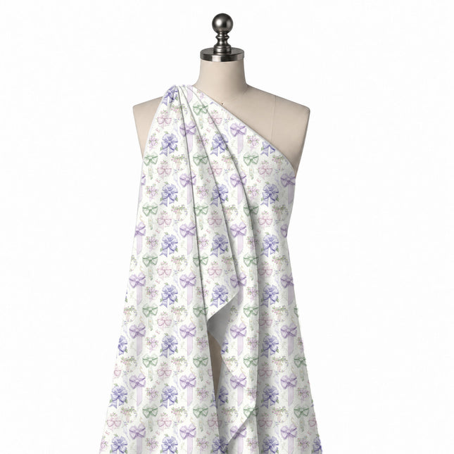 Draped on a mannequin: one-way all-over print of medium satin bows in lavender, lilac, design Design No_4422, Clothwala