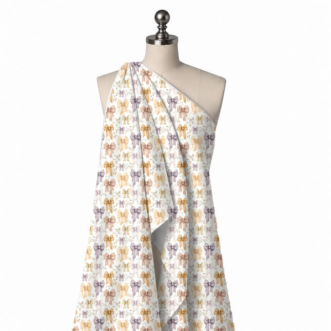 Draped on a mannequin: one-way all-over layout of medium watercolour ribbon bows with, design Design No_4395, Clothwala