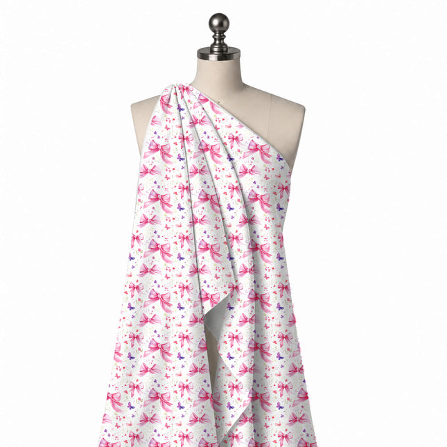 Draped on a mannequin: spaced layout of large and medium pink watercolour bows with, design Design No_4471, Clothwala