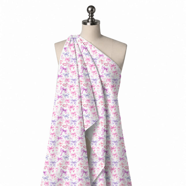 Draped on a mannequin: all-over layout of medium soft-shaded bows in pink, design Design No_4463, Clothwala