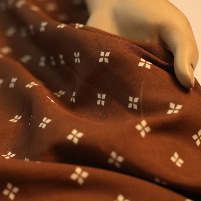 SOFT FEEL POLY CREPE  BROWN BLOCK STAR PRINT