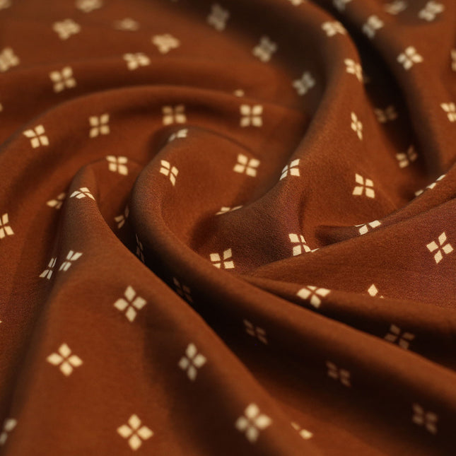SOFT FEEL POLY CREPE  BROWN BLOCK STAR PRINT
