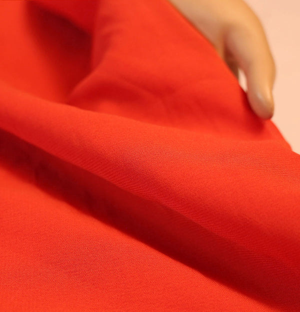 POLY GRAINY GEORGETTE ORANGE SOLID FABRIC