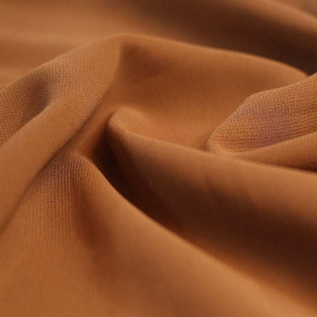 POLY GRAINY GEORGETTE BROWN SOLID FABRIC